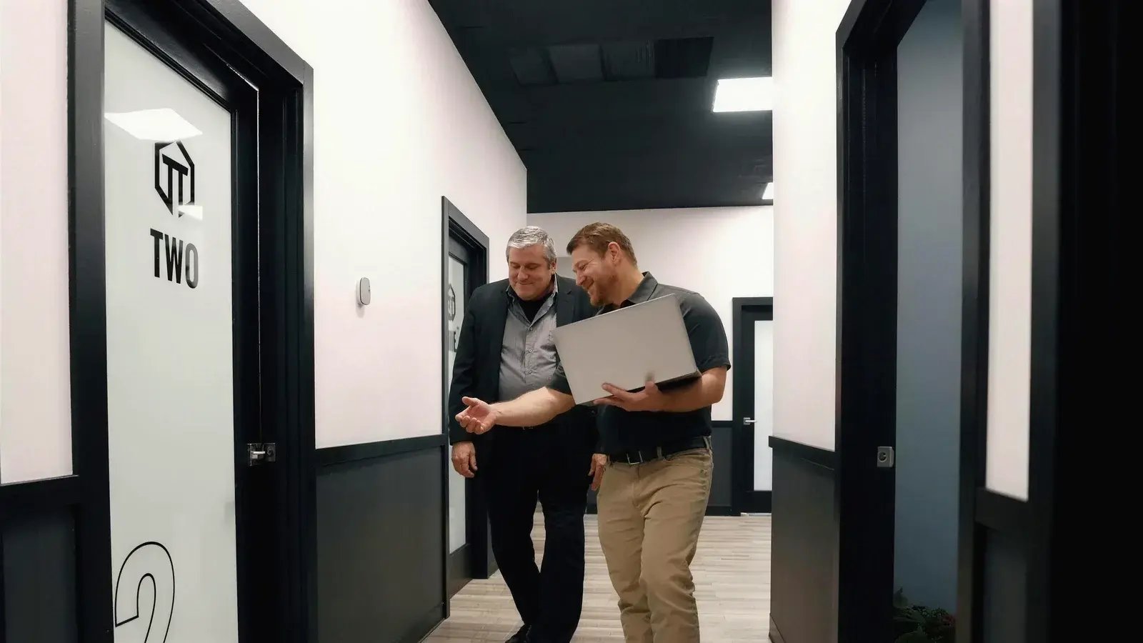 Walking a patient down the hall to his consult room inside a True Test clinic